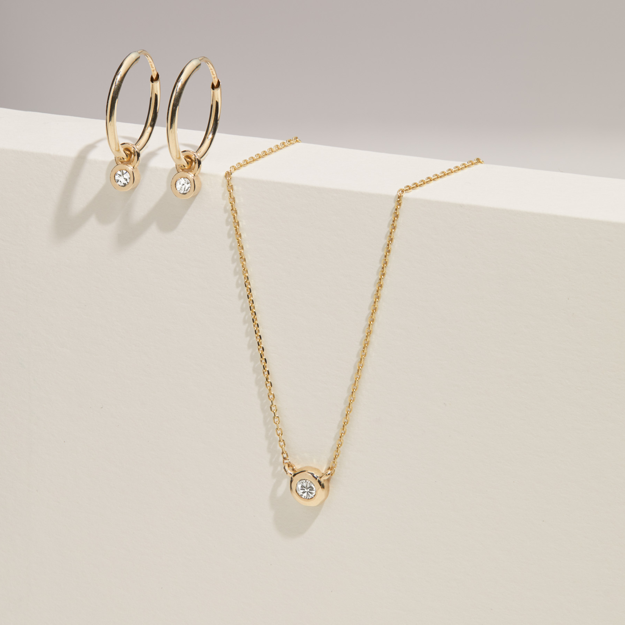 Solid White Gold Mini Floating Diamond Hoop Earrings