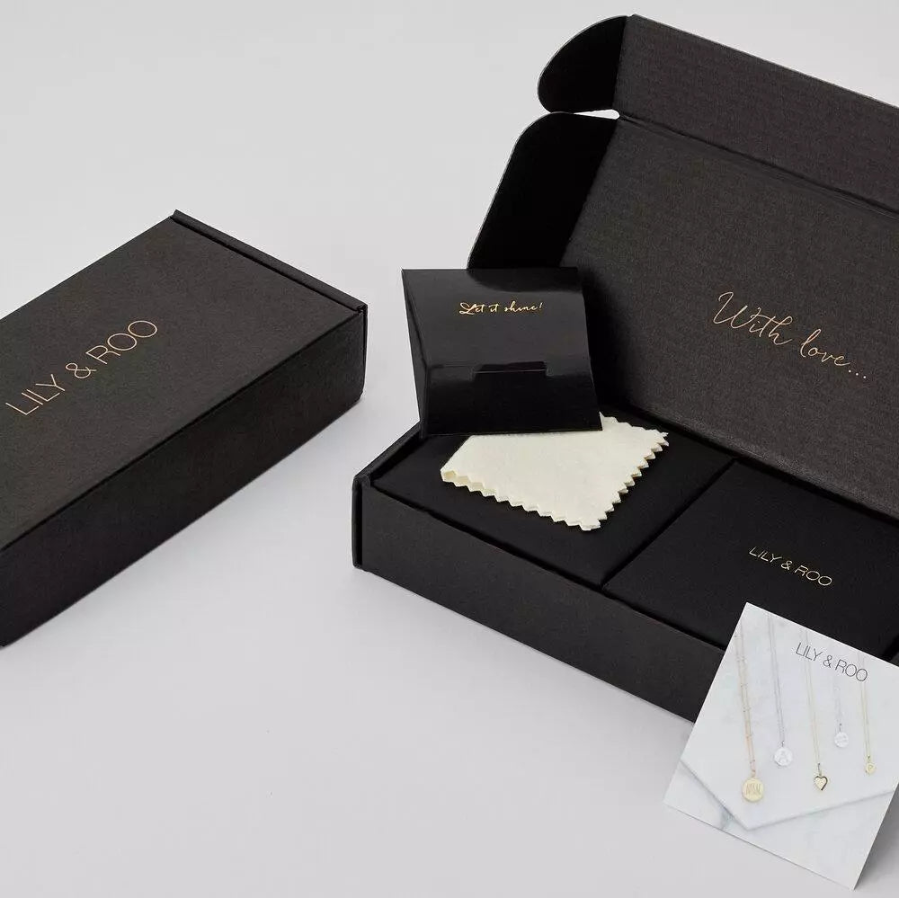 Black gift wrapping jewellery boxes open and closed