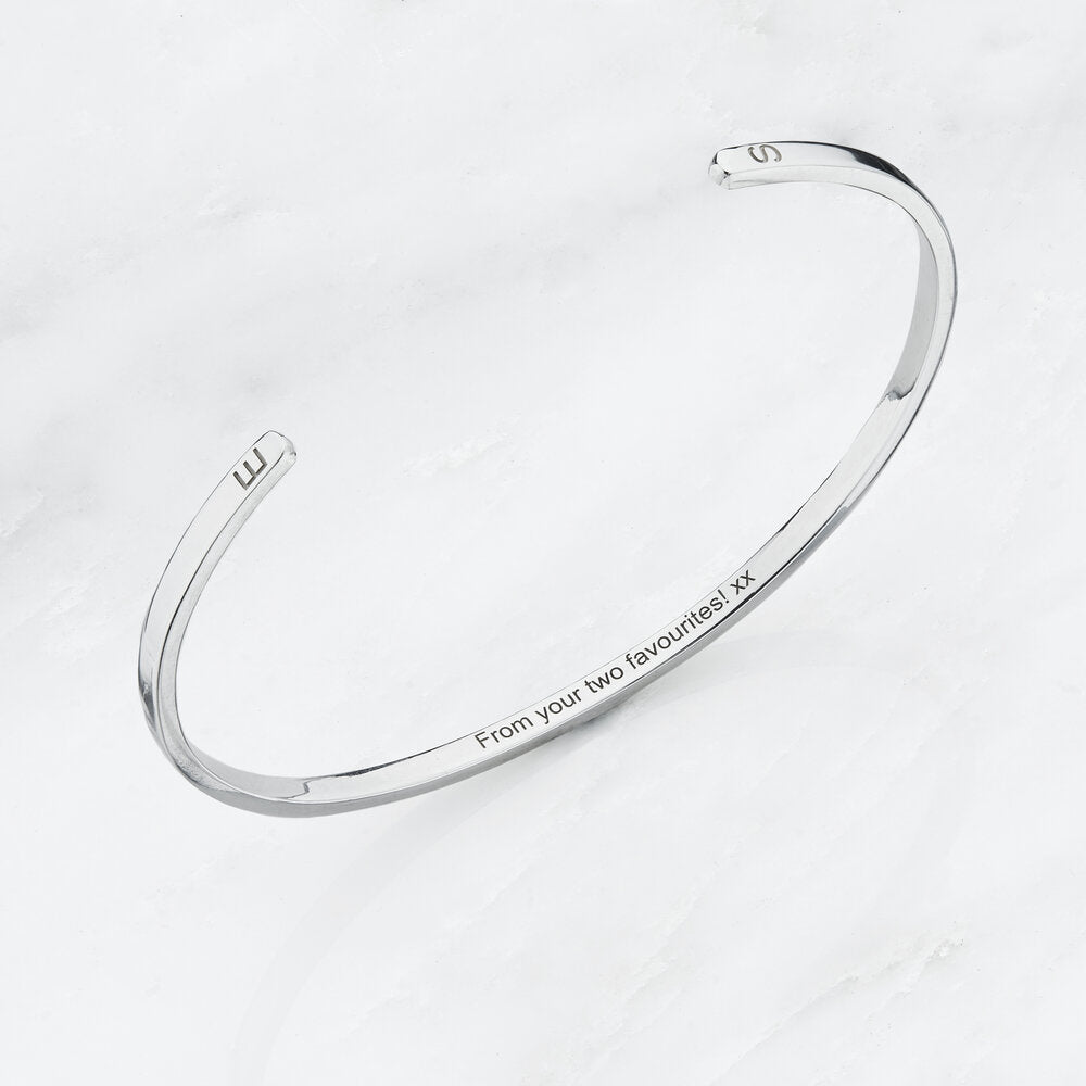 Silver thin engraved bangle with the letters 'B' and 'S' engraved on the outside and 'from your favourites! xx' engraved on the inside 