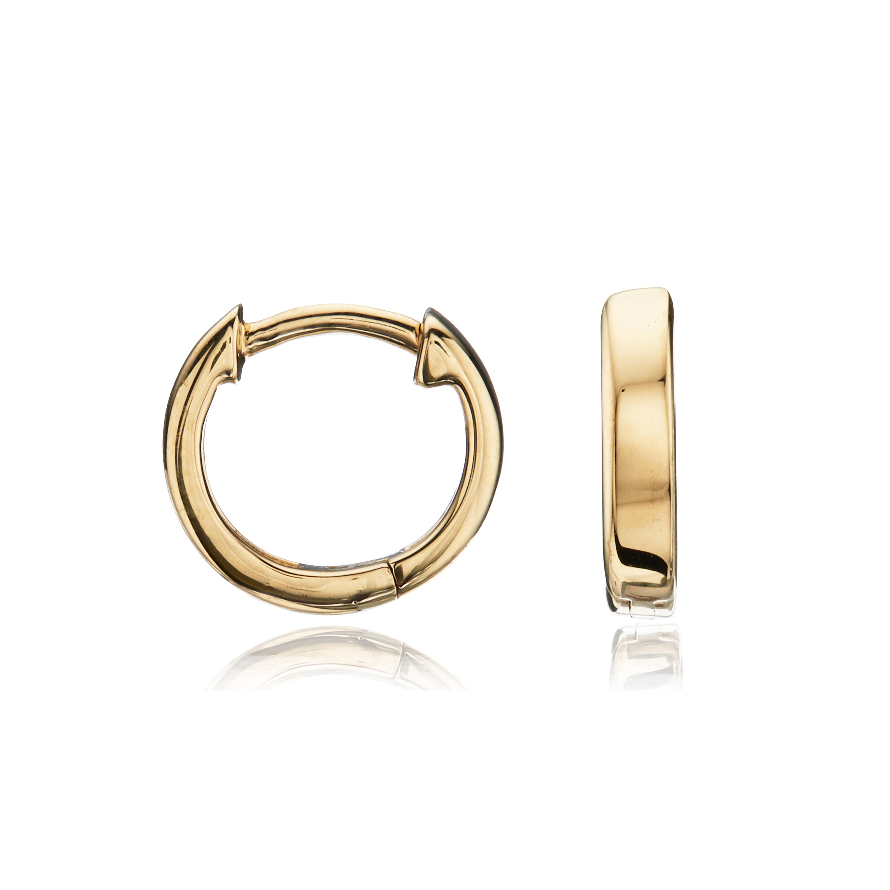 Gold plain huggie hoop earrings on a white background