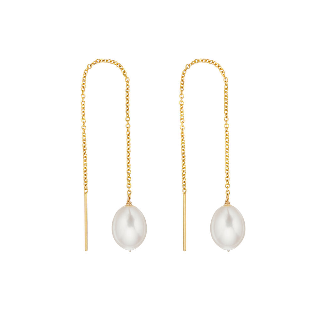 Gold large pearl drop ear threaders on a white background