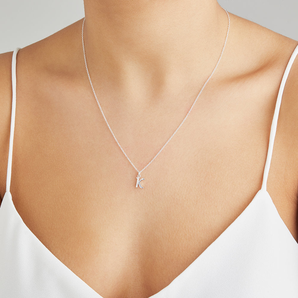 Silver curve initial letter necklace 'K'