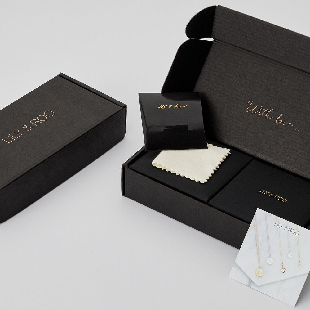 Black cardboard gift wrapping boxes with the words 'LILY & ROO' and 'With Love' in gold