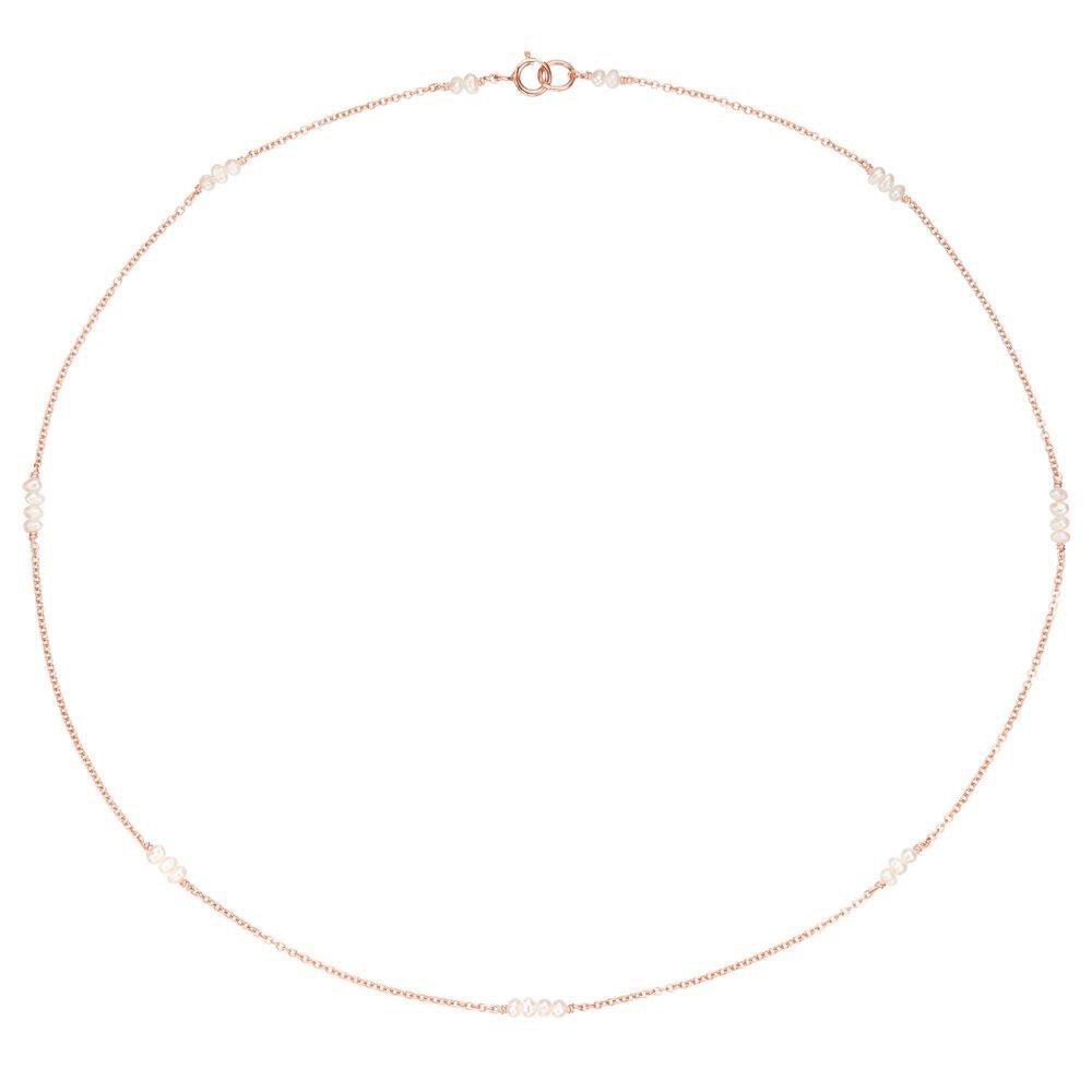 Rose gold mini pearl choker on a white background