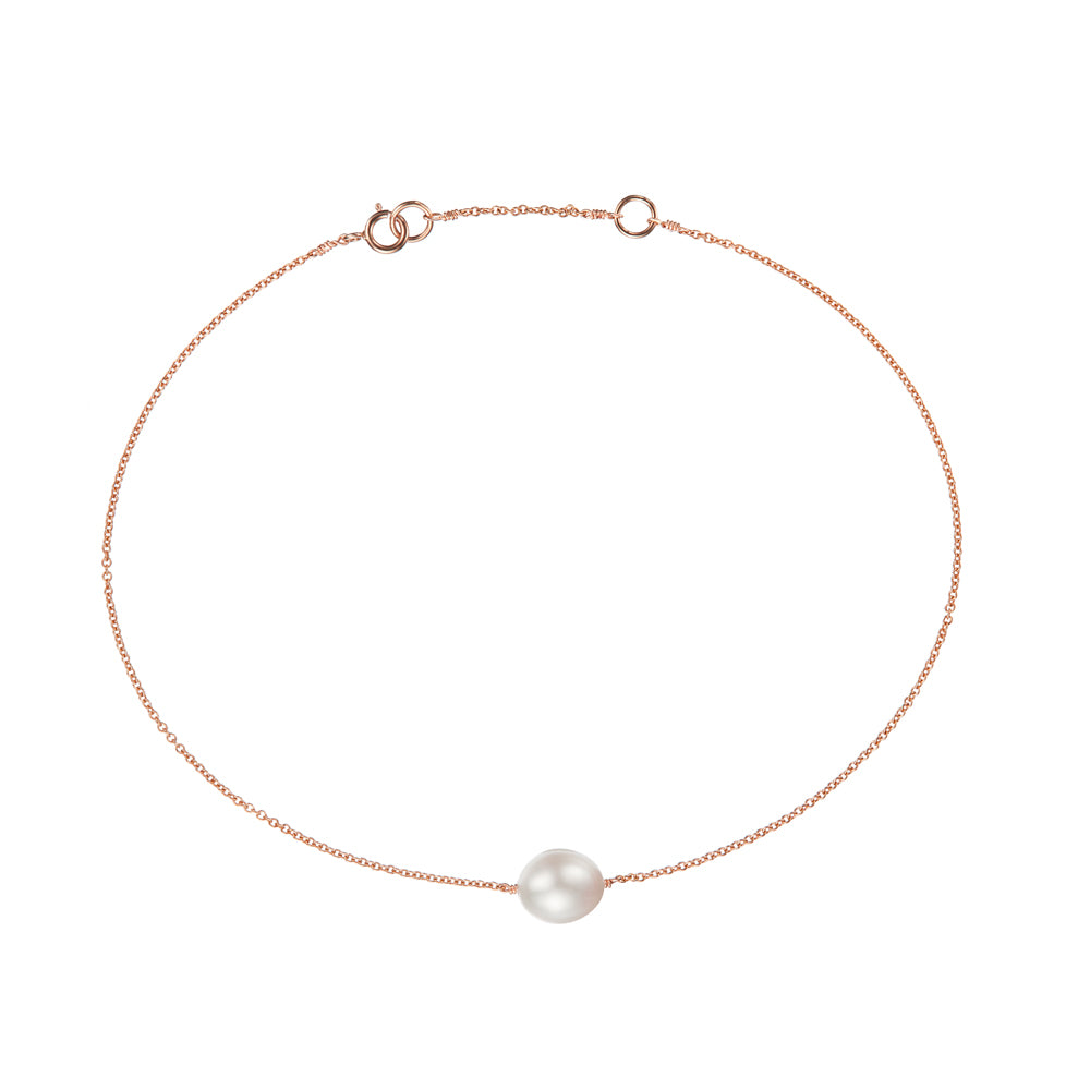 Rose gold small pearl anklet on a white background
