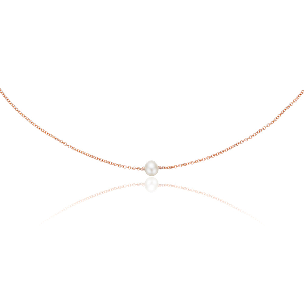 Rose gold single pearl choker on a white background
