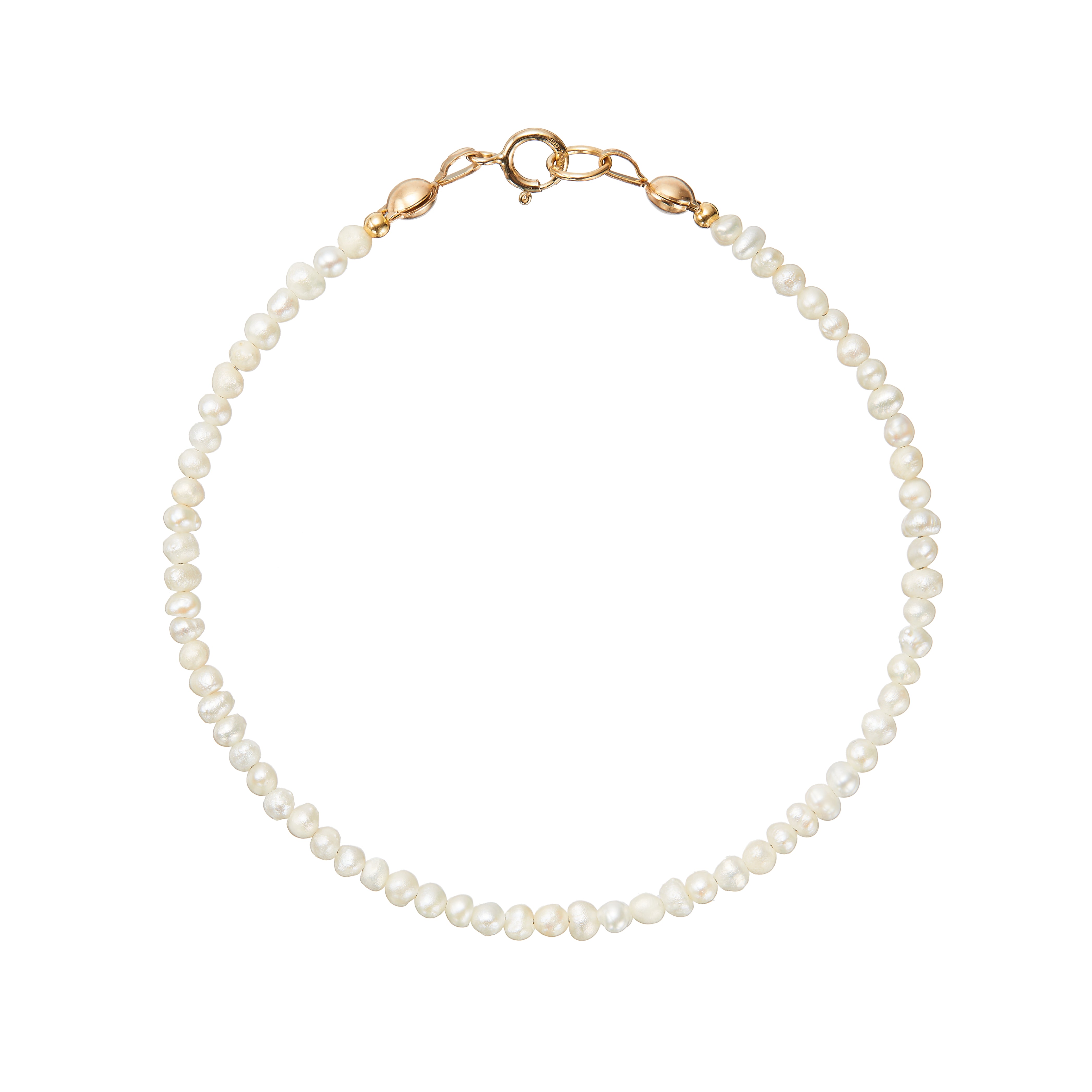 Gold small pearl bracelet on a white background
