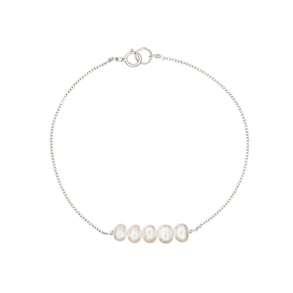 Silver cluster pearl bracelet on a white background