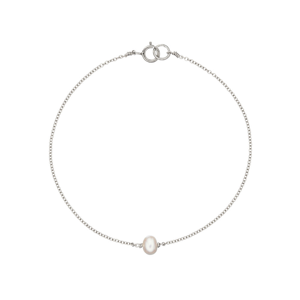 Silver single pearl bracelet on a white background