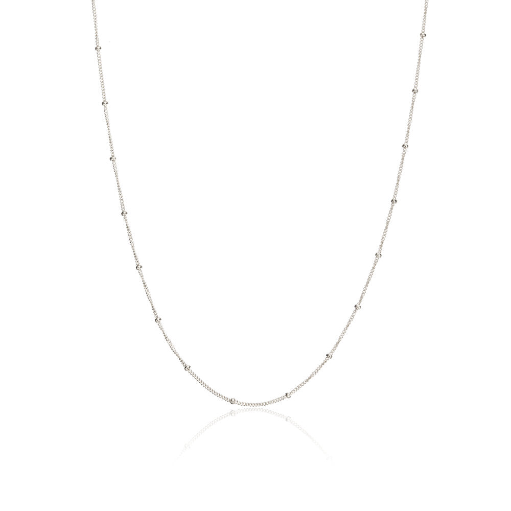 Silver satellite chain necklace on a white background