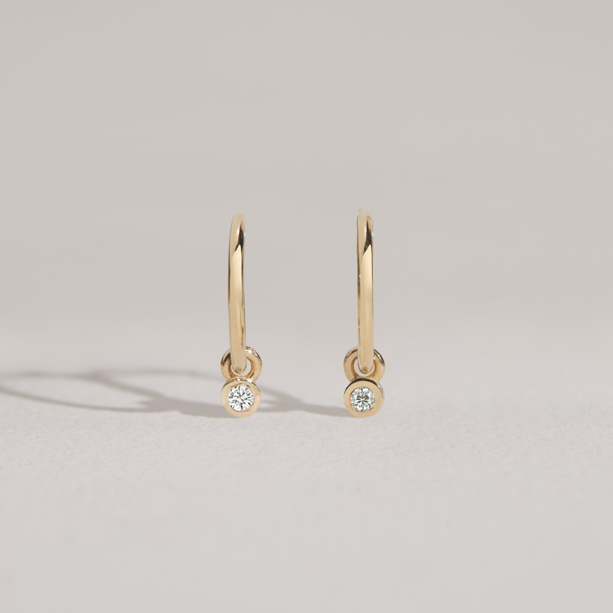 Solid Gold Mini Floating Diamond Hoop Earrings