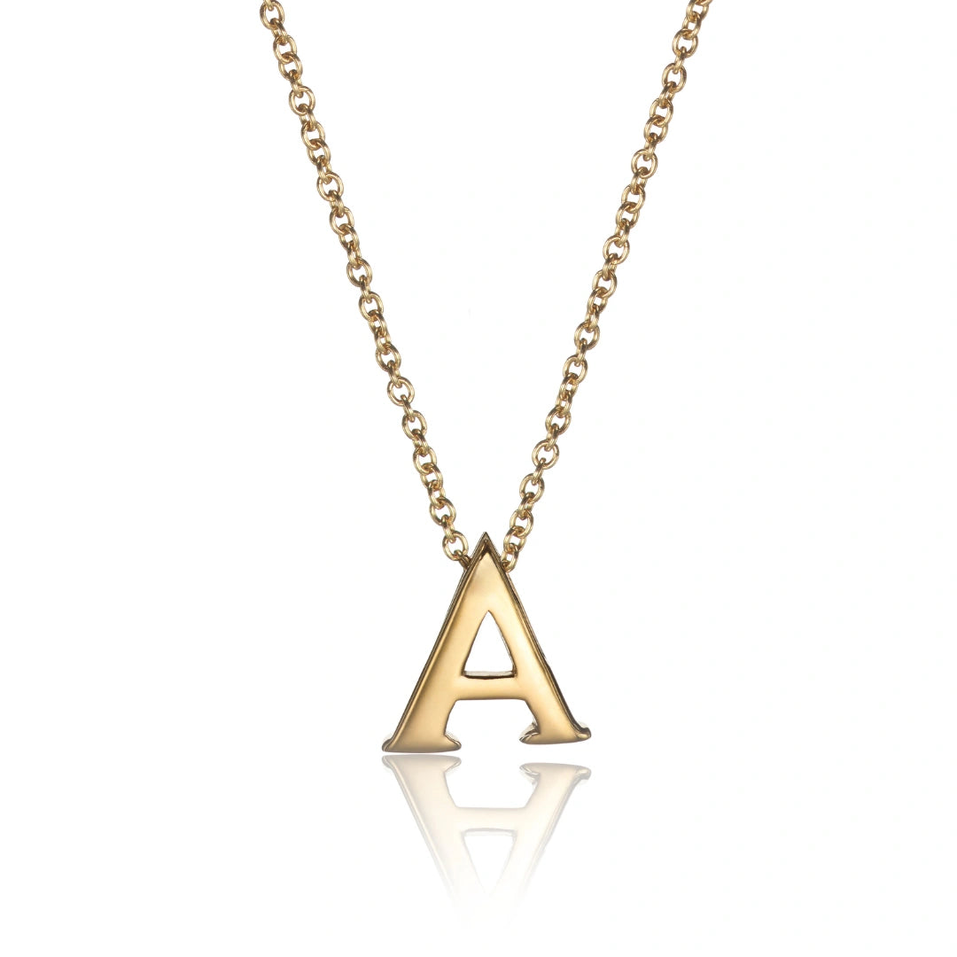 Gold necklace with a letter 'A' pendant on a white background