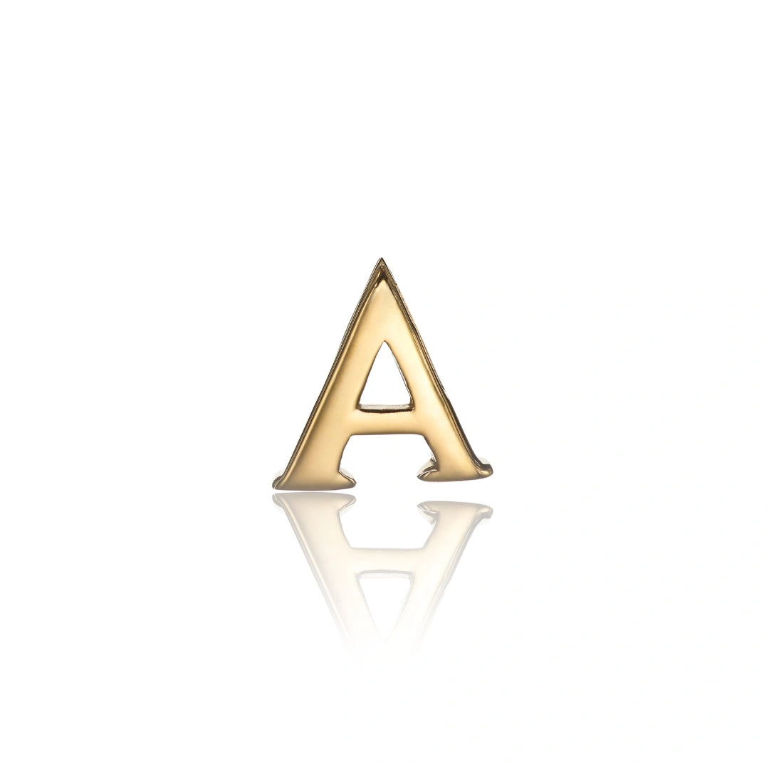 Gold letter 'A' charm on a white background