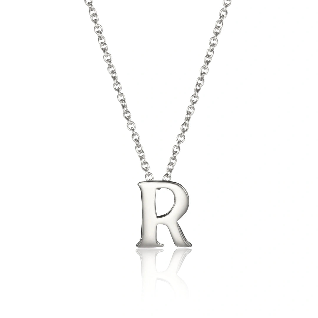 Silver necklace with a letter 'R' pendant on a white background