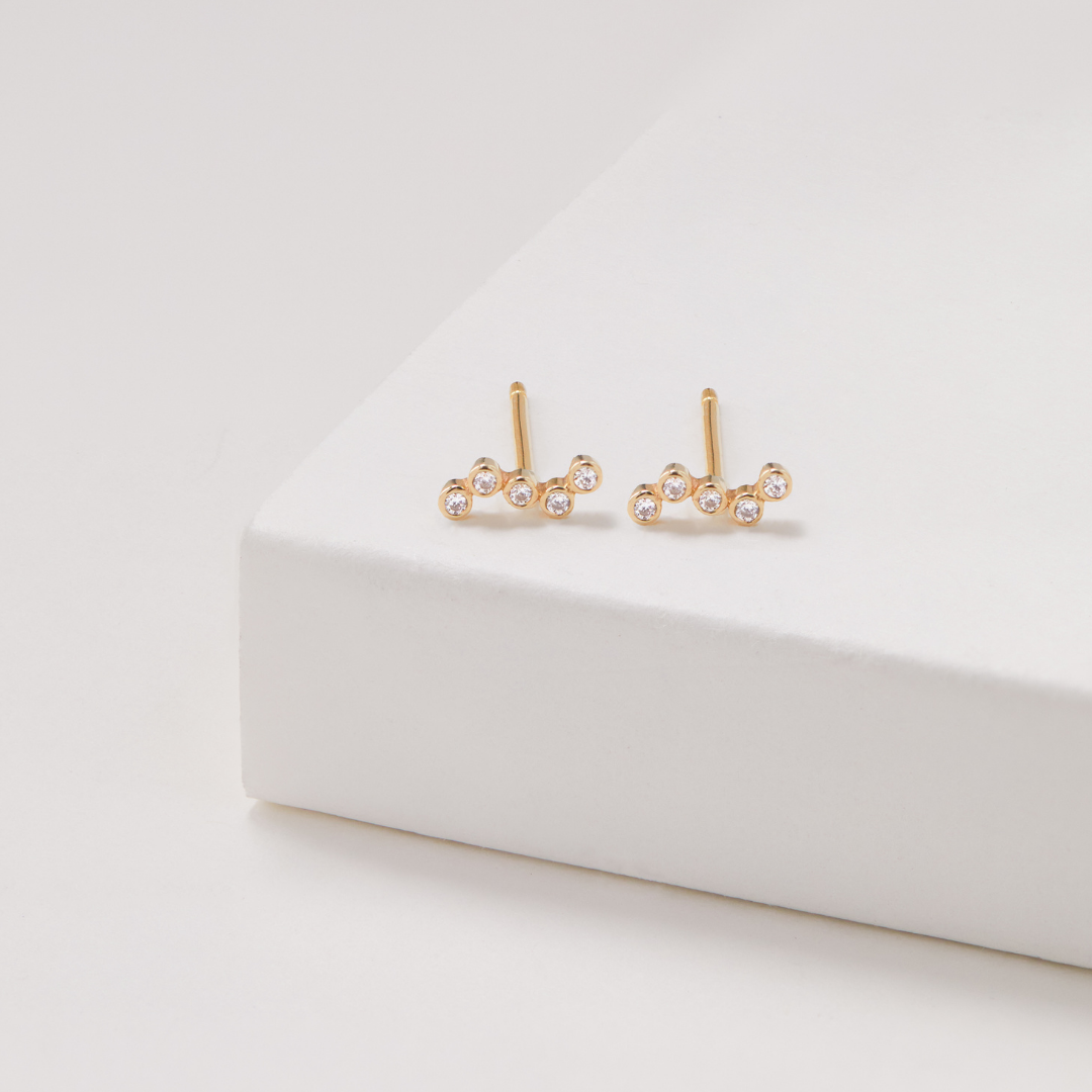 Gold Diamond Style Wave Stud Earrings