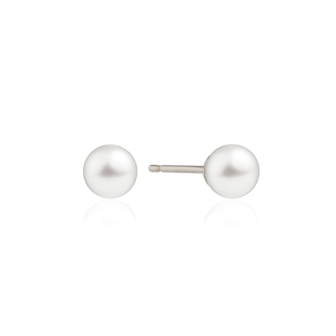 Silver single pearl stud earring on a white background