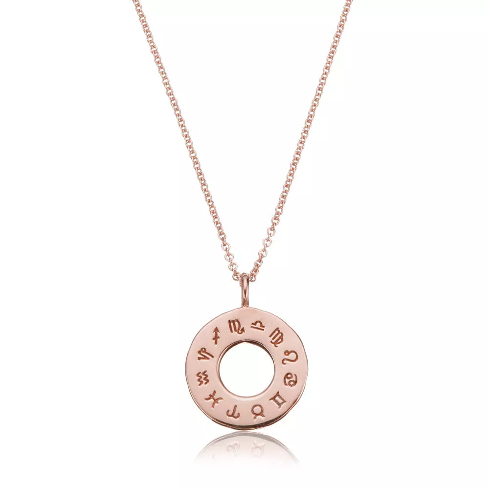Rose gold zodiac birthstone necklace on a white background