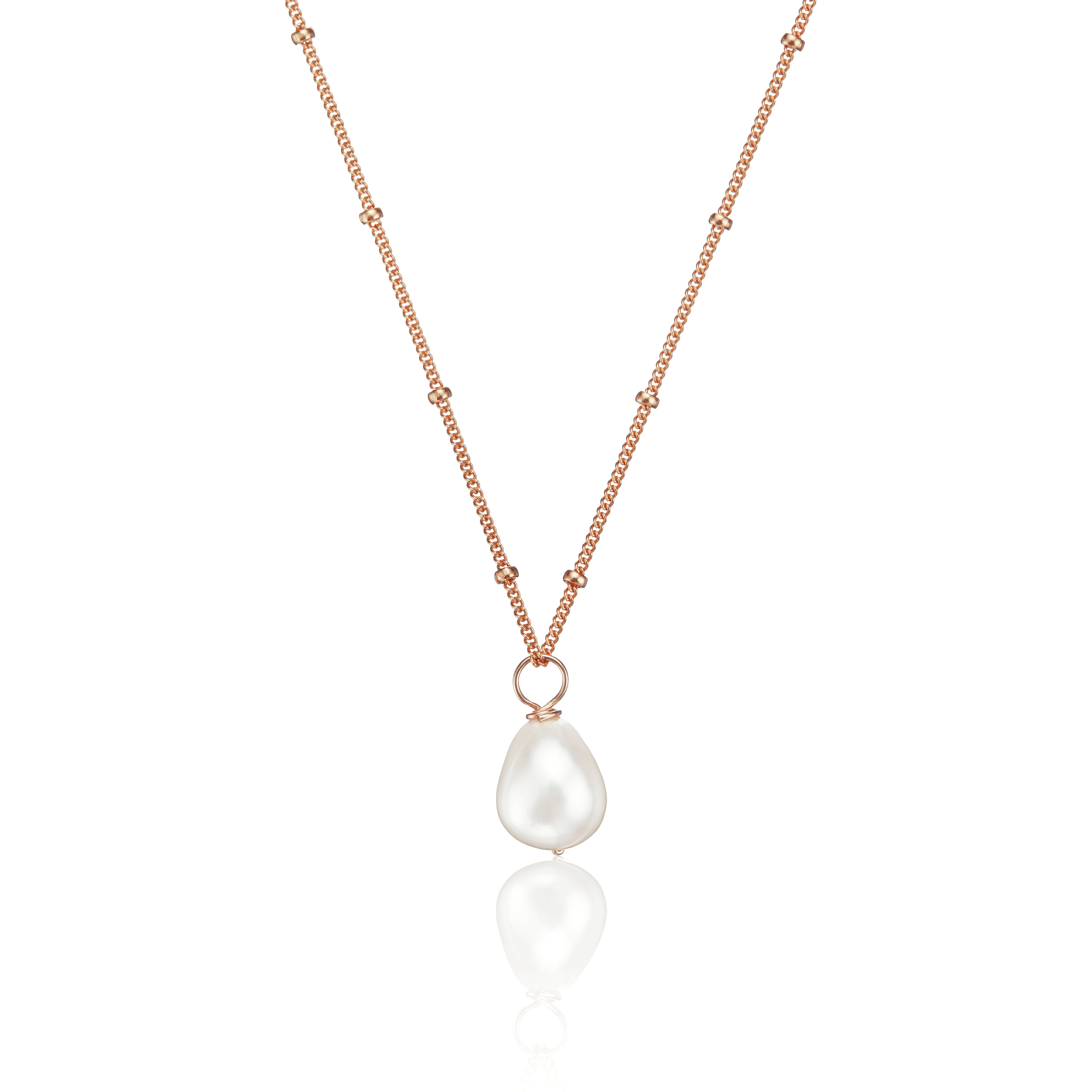 Rose gold large pearl satellite necklace on a white background
