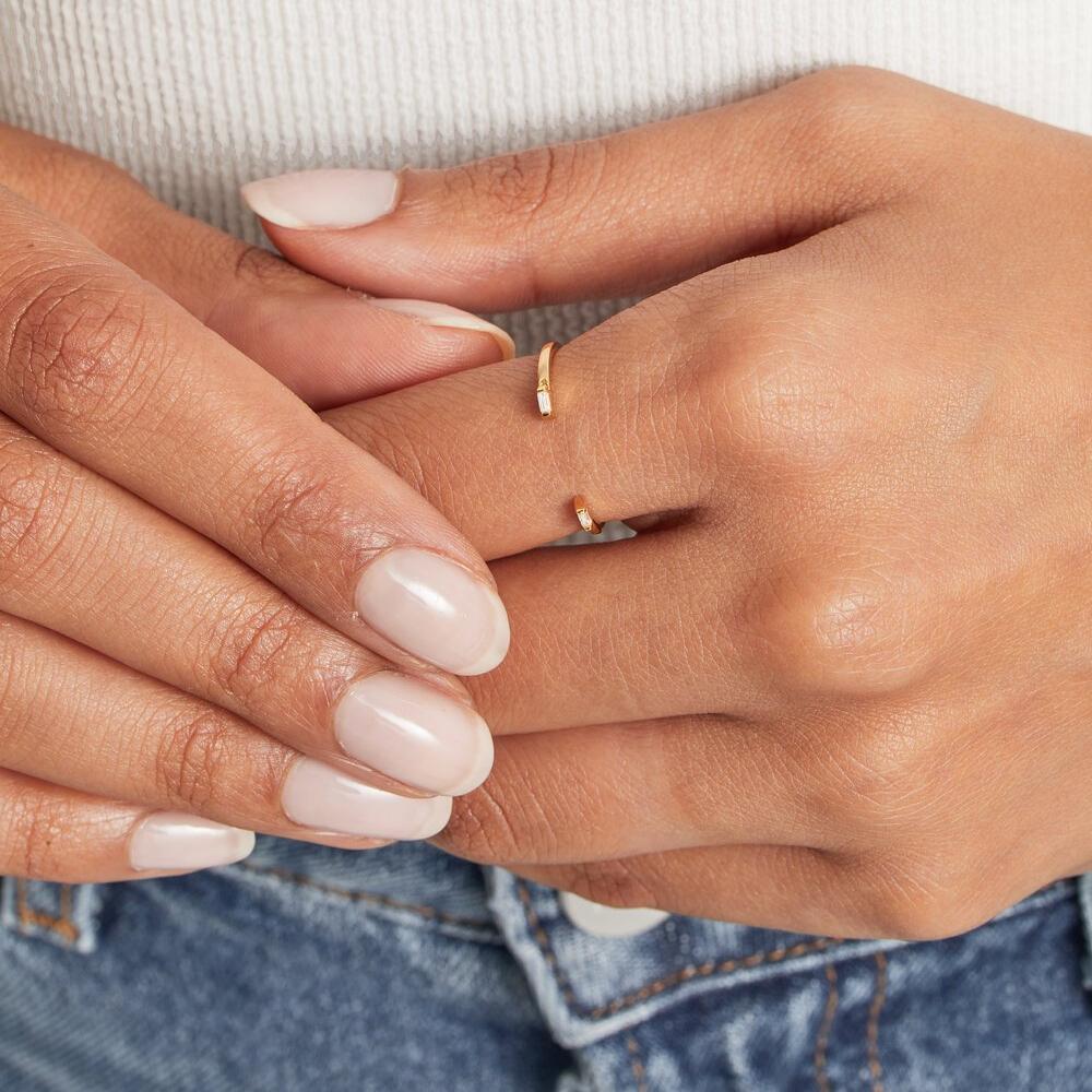 Gold Diamond Style Baguette Gap Ring on model's hand