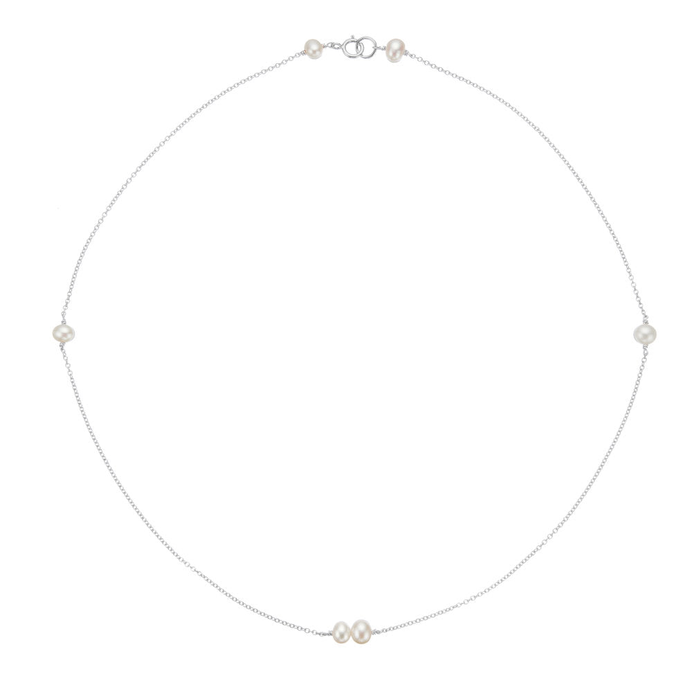 Silver six pearl choker necklace on a white background