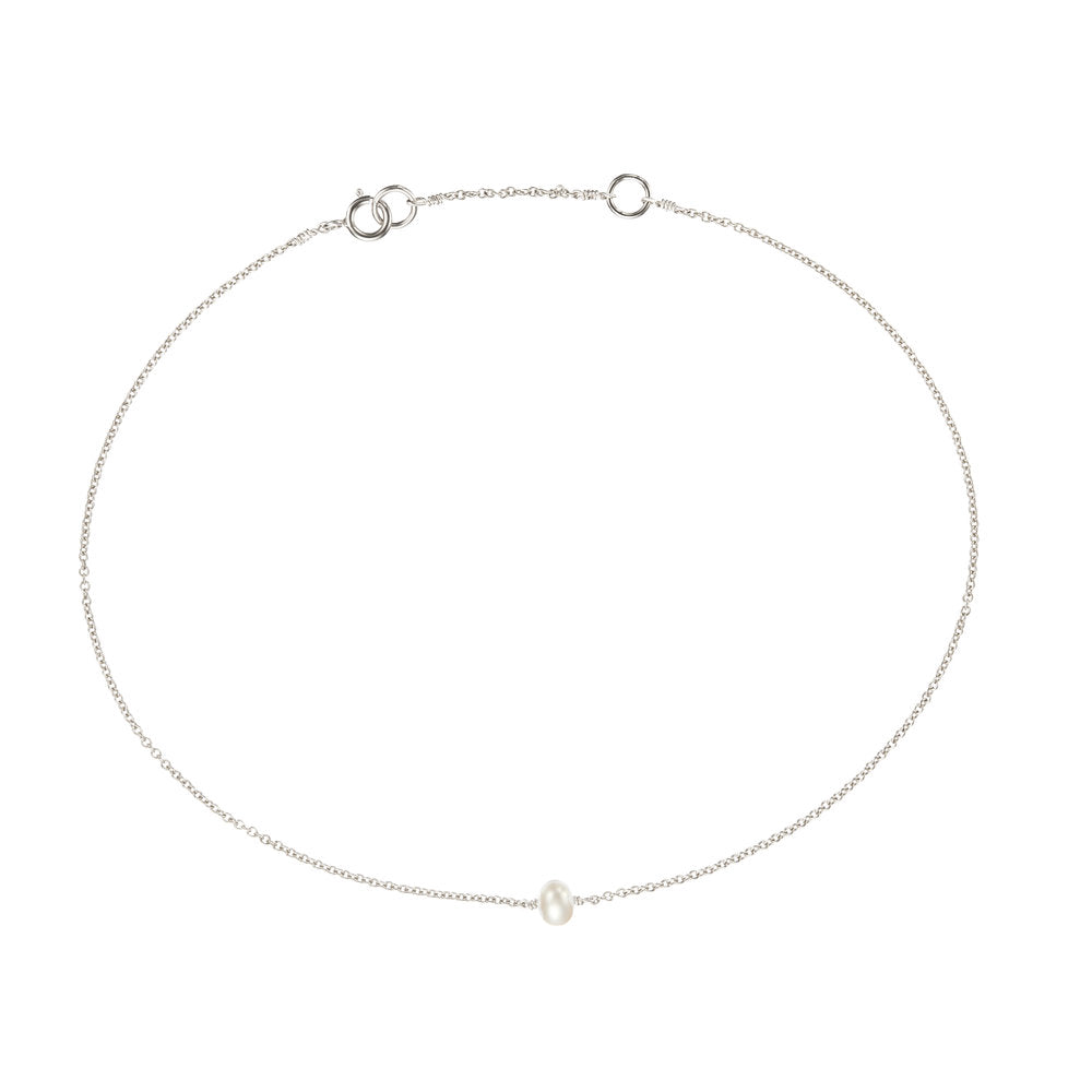 Silver small pearl anklet on a white background