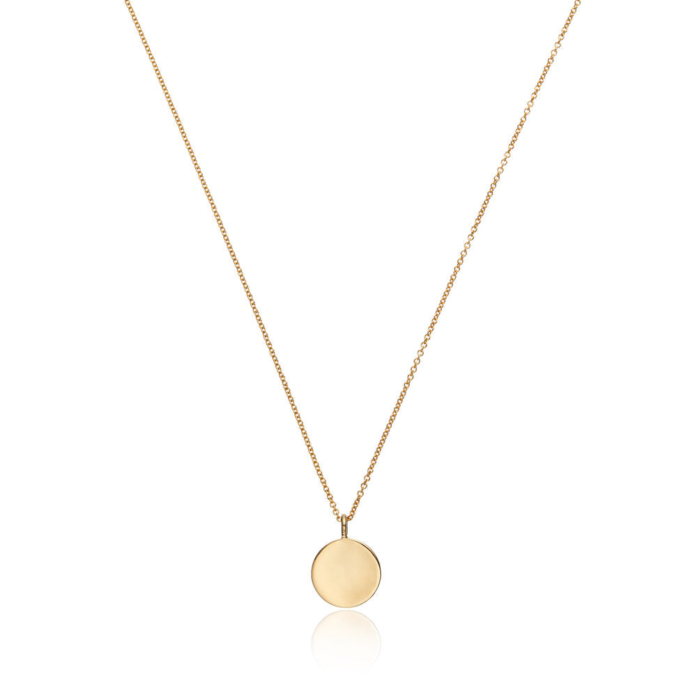 Gold small diamond style disc necklace on a white background