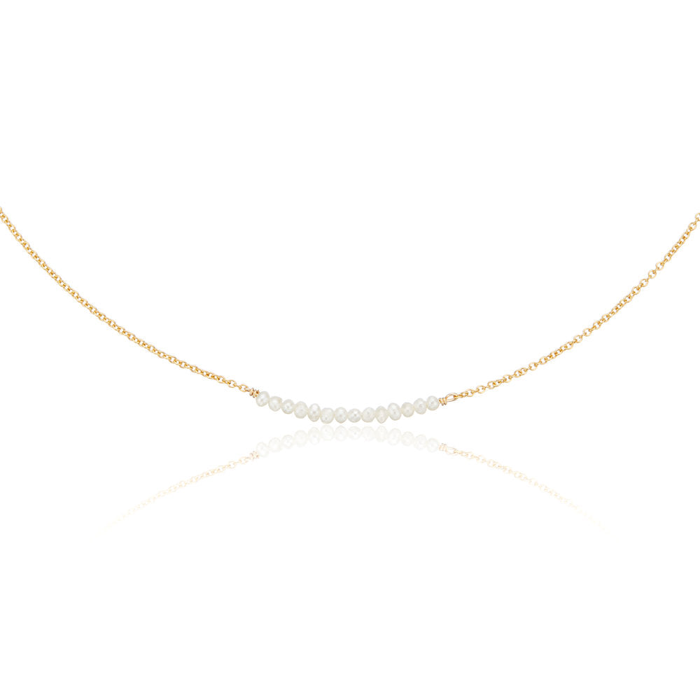 Gold small pearl cluster choker on a white background