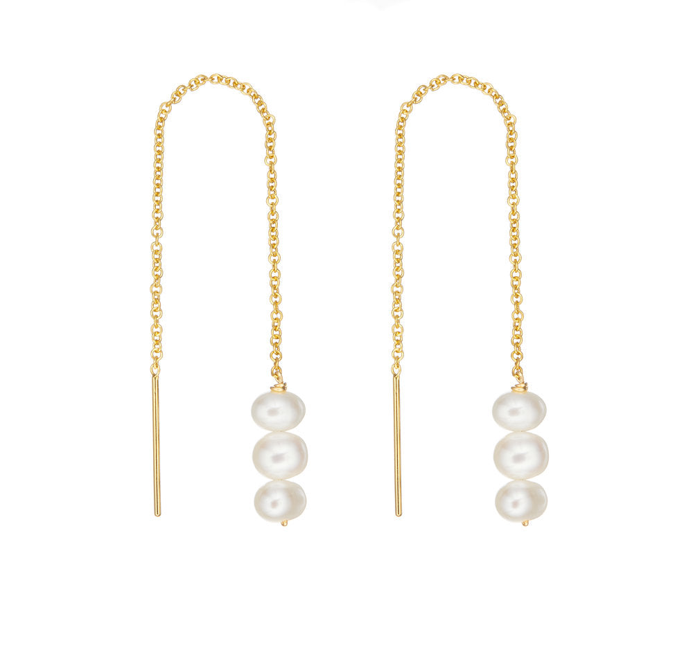 Gold cluster pearl drop ear threaders on a white background