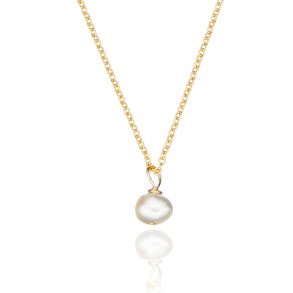 Gold single pearl necklace on a white background