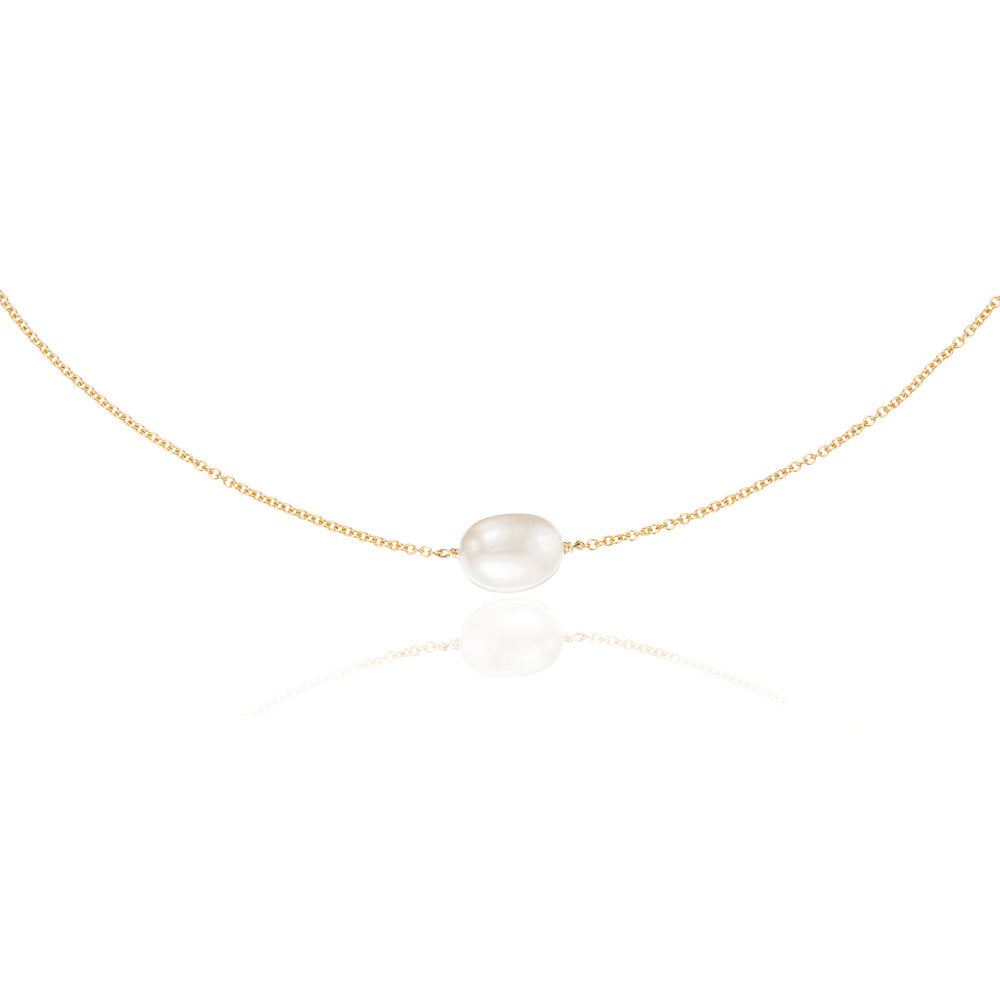 Gold large single pearl choker on a white background