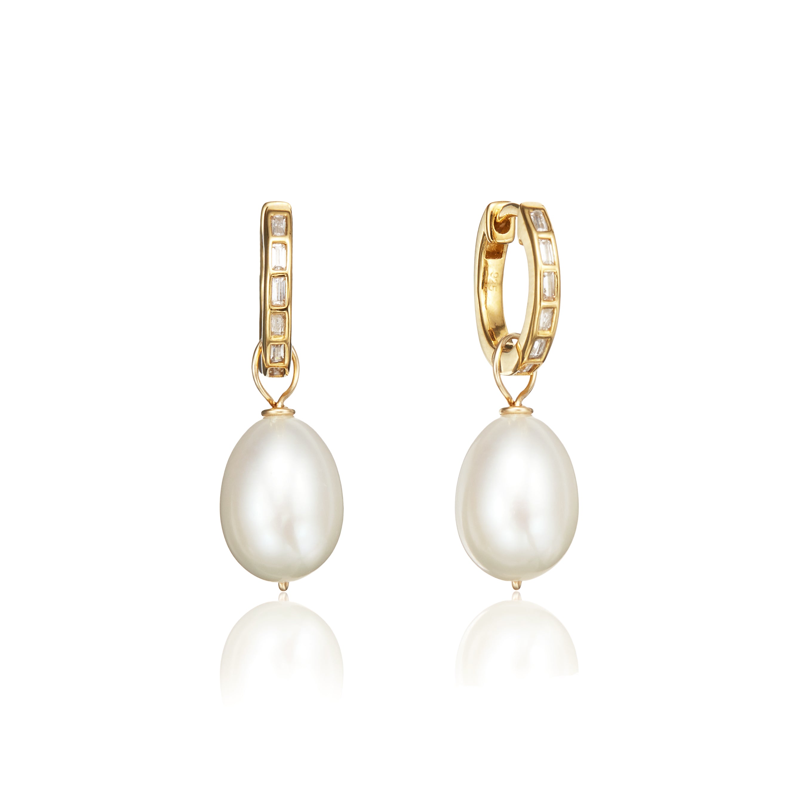 Gold diamond style baguette pearl drop hoop earrings on a white background