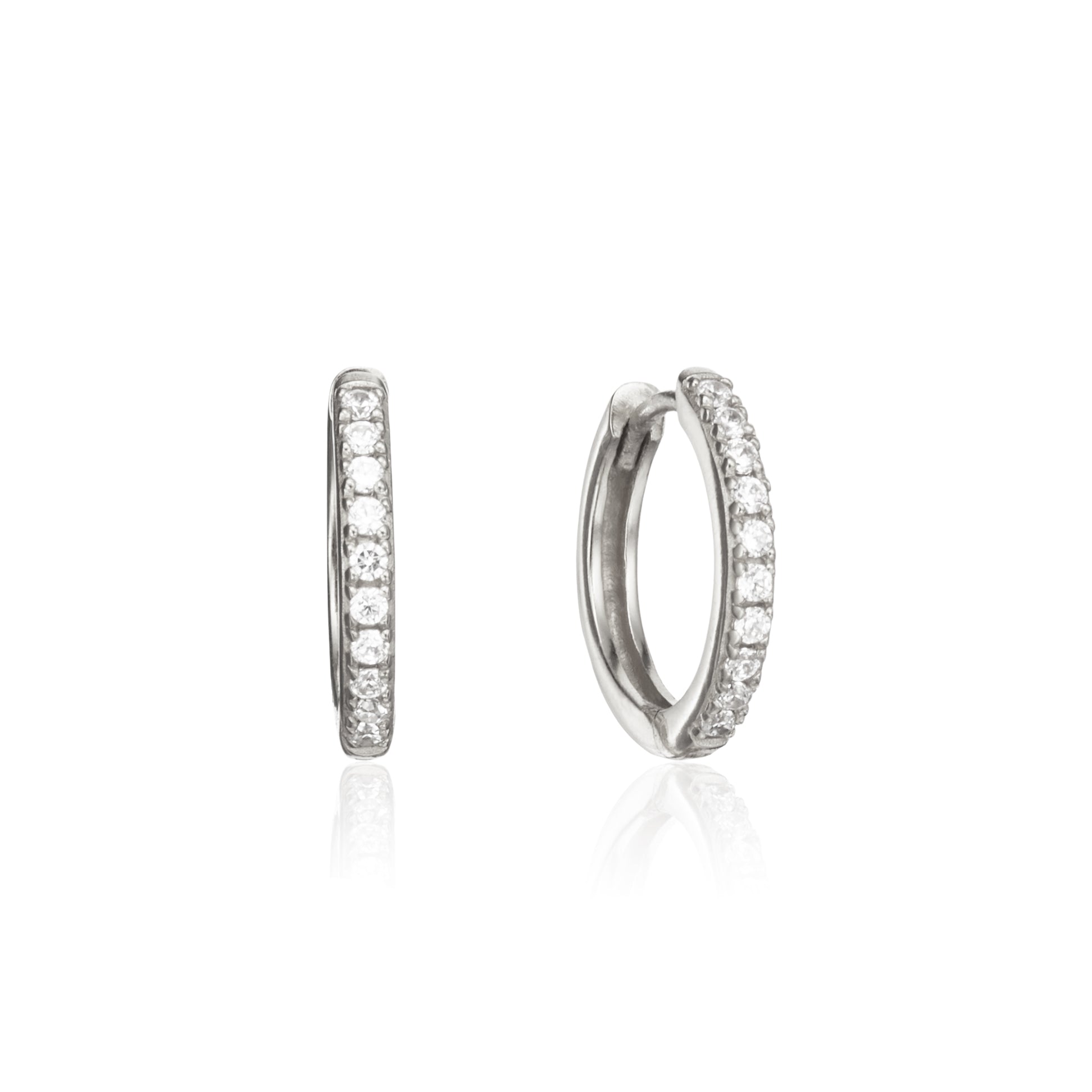 Silver diamond style large hoop earrings on a white background