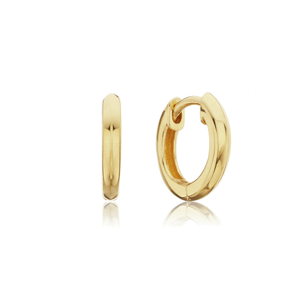Gold small rounded plain huggie hoop earrings on a white background