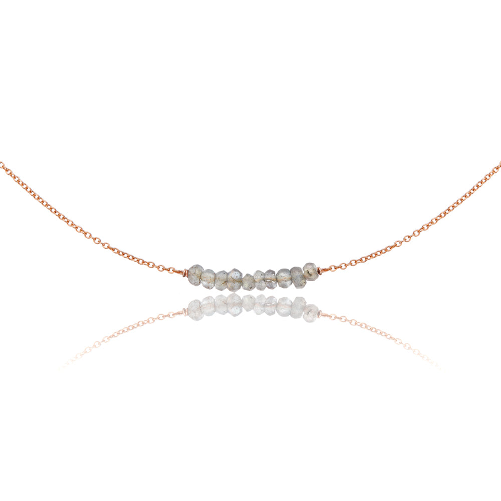 Rose gold labradorite gemstone cluster choker on a white background