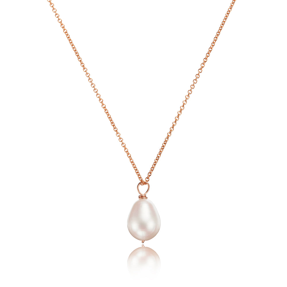 Rose gold large single pearl necklace on a white background