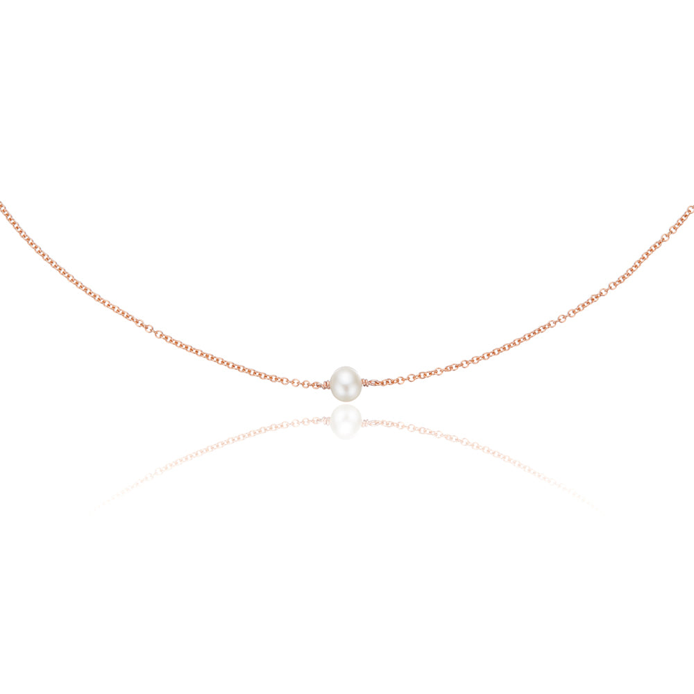 Rose gold single pearl choker on a white background