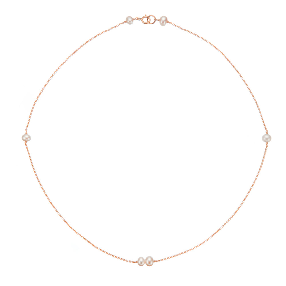 Rose gold six pearl choker necklace on a white background