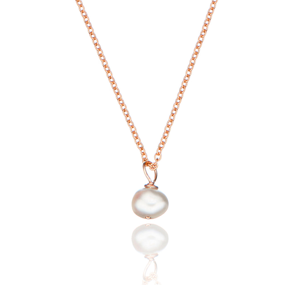 Rose gold single pearl necklace on a white background