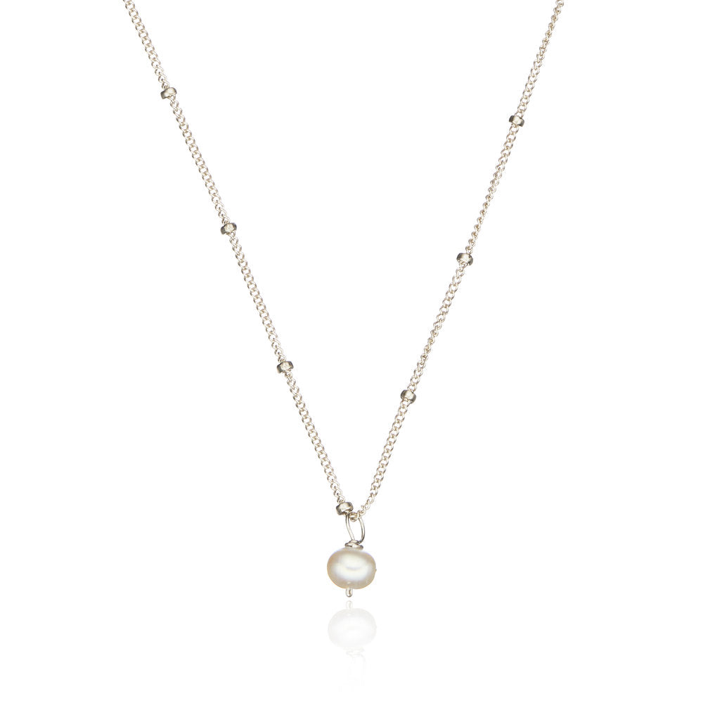 Silver single pearl satellite necklace on a white background