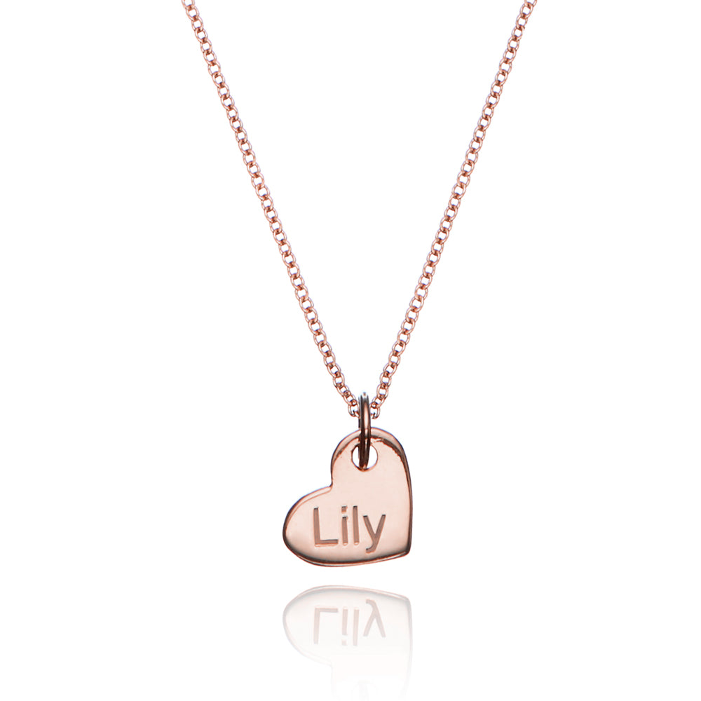 Rose gold small personalised heart necklace with the name 'Lily' engraved on a white background