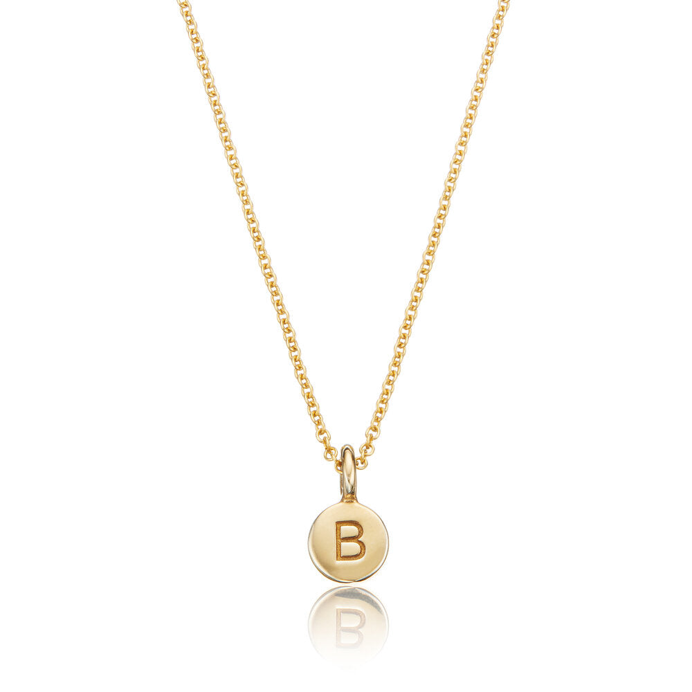 Gold extra small personalised letter B disc necklace on a white background