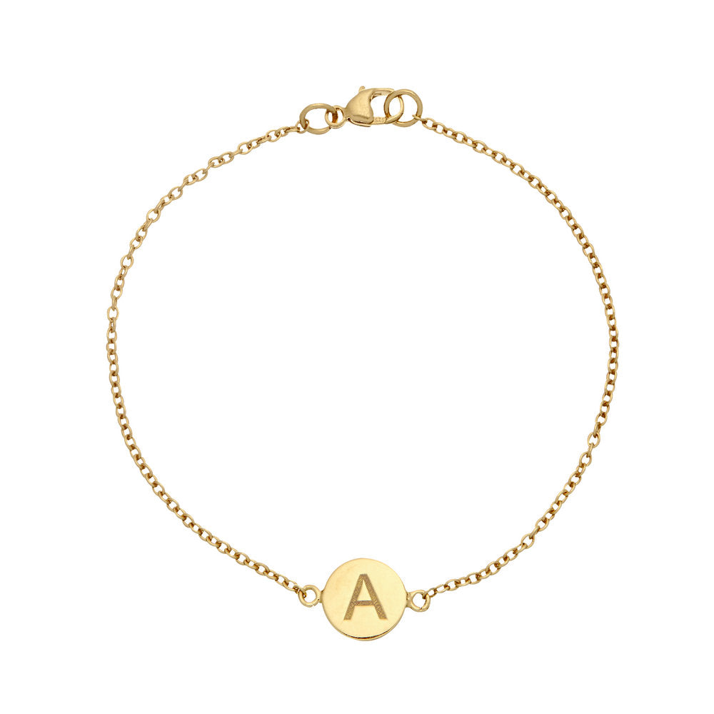 Gold personalised disc bracelet with the letter 'A' engraved on it on a white background